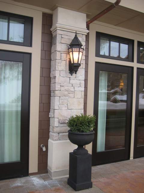 Lantern on column between rooms at a ski resort.